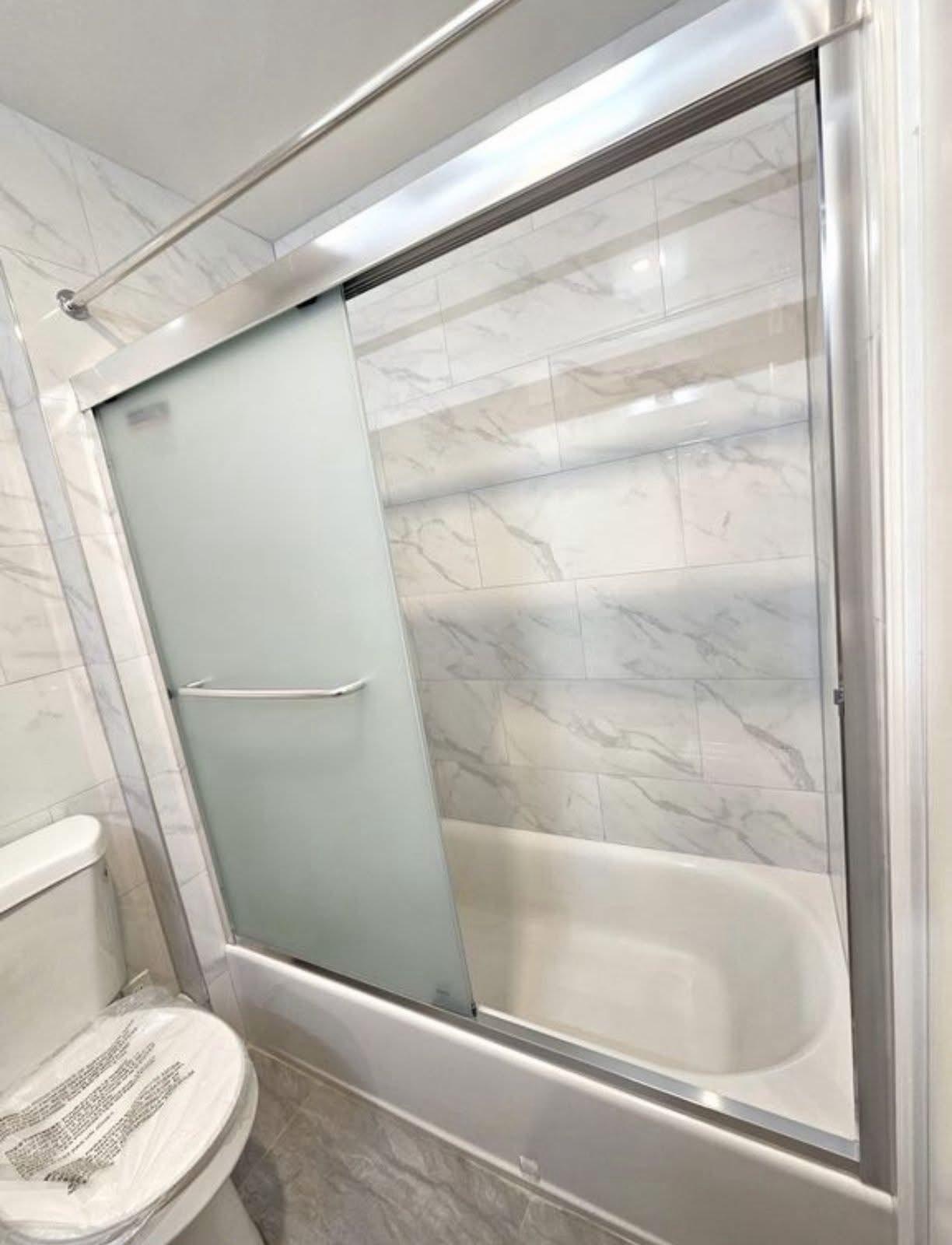 Sparkling clean marble bathroom after cleaning